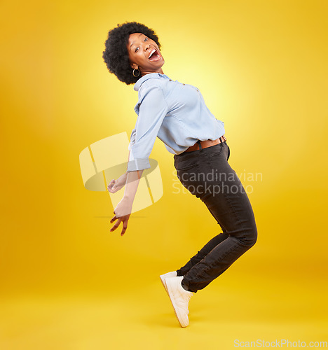 Image of Wow, excited and happy black woman in dance pose on yellow background with energy, happiness and smile. Winner mockup, celebration and isolated girl dancing for freedom, winning and success in studio