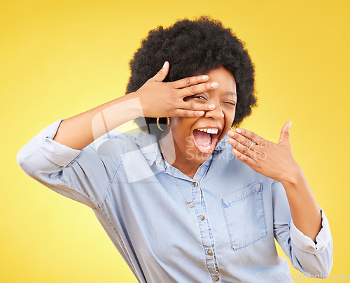 Image of Excited black woman surprised hand on face and shocked winning person isolated in studio yellow background. Portrait, V and female winner happy for a deal, sale and announcement of good news