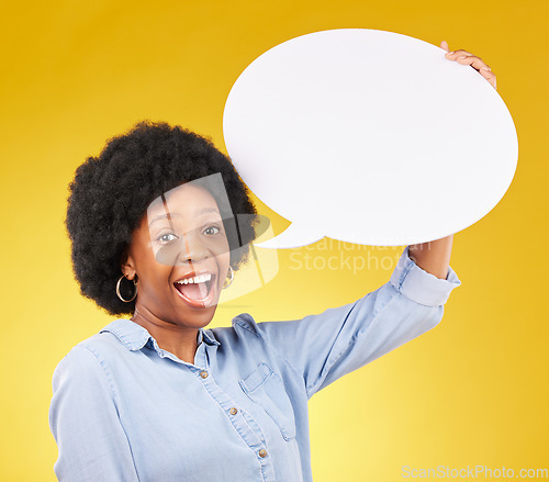 Image of Speech bubble, portrait and happy black woman in studio with mockup for social media, advertising or space. Face, poster and girl with billboard on news, announcement or branding on yellow background