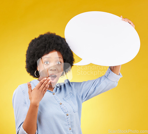 Image of Speech bubble, portrait and wow by black woman in studio with mockup for social media, advertising or space. Face, poster and shocked girl with billboard for news or announcement on yellow background