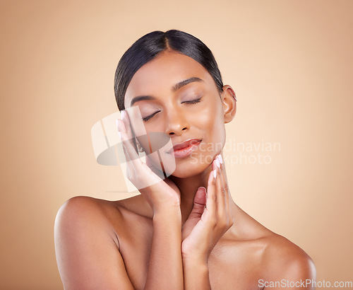 Image of Skincare, self love and hands on face of woman in studio for beauty, wellness and relax on brown background. Skin, satisfaction and girl model enjoy body care, cosmetics and treatment while isolated