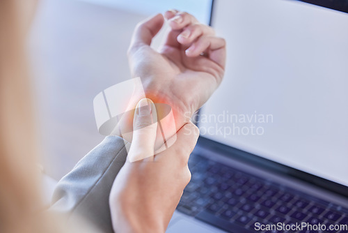 Image of Business woman, wrist injury and red pain from osteoporosis, orthopedic joint and laptop typing in office. Worker, carpal tunnel and hands of health risk, arthritis and muscle fatigue of fibromyalgia