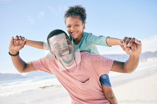 Image of Child, black man and piggy back at ocean on playful family holiday in Australia with freedom, fun and energy. Travel, fun and happy father and girl with smile playing and bonding together on vacation