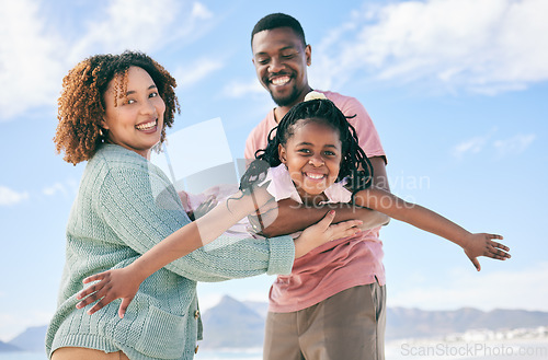 Image of Portrait, fly or girl with parents at beach on summer holiday vacation or weekend together as a happy family. African father, fun mother or excited child love bonding, relaxing or playing in nature