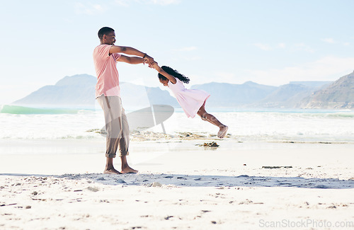 Image of Ocean, black man swinging child and playful family holiday in Australia with freedom and energy. Travel, spinning and happy father and girl with smile playing and bonding together on beach vacation.