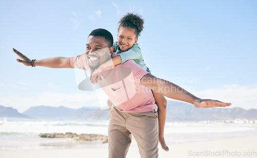 Image of Beach, black man flying with child on back and playful family holiday in Australia with freedom and energy. Travel, fun and happy father and girl with smile playing and bonding together on vacation.