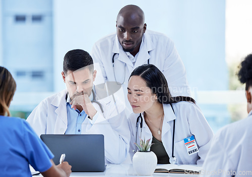 Image of Healthcare, doctors and thinking on laptop for teamwork analysis, test results and medicine research. Diversity, medical group and computer planning for information, hospital collaboration and review