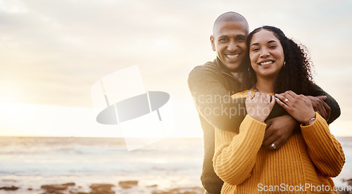 Image of Hug, happy and portrait of a couple at the beach for a date, bonding or sunset in Bali. Love, embrace and young man and woman smiling while relaxing at the ocean for vacation with mockup space