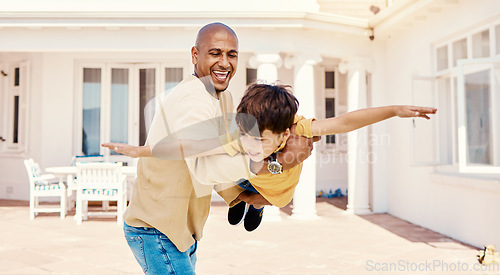 Image of Playing, flying and smile of a child with a father for freedom, imagination or bonding. Happy, play and carefree dad holding boy kid to pretend to fly, adventure and happiness together at home