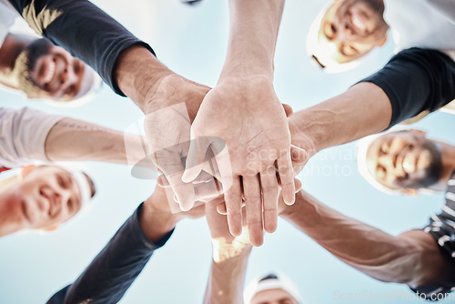 Image of Hands, baseball motivation or sports men in huddle with support, hope or faith on field in fun game together. Teamwork, happy people or group of excited softball athletes with solidarity low angle