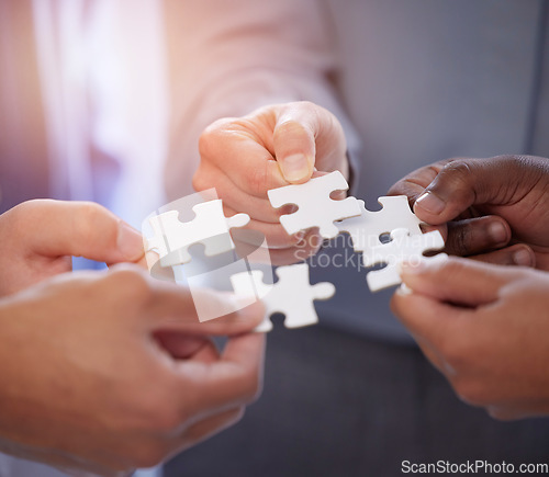 Image of Puzzle, group of people hands for solution, teamwork and workflow goals, achievement and success closeup. Team building game, project development and person problem solving, synergy or collaboration