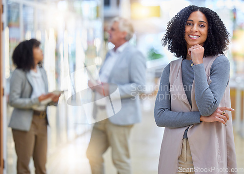 Image of Business, woman and portrait with smile for empowerment, motivation and professional project manager. Happy young female employee standing in company for happiness, pride or confidence in busy office