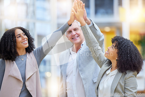 Image of High five, diversity business people and hands in office for teamwork, motivation and collaboration. Excited group of employees, smile and join hand in company for success, winning deal and celebrate