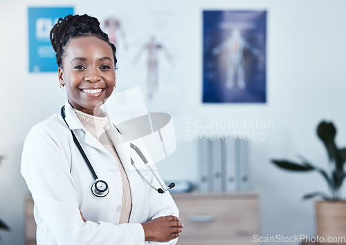 Image of Happy, portrait and black woman doctor proud in hospital, excited or cheerful for healthcare innovation. Face, confident and female health expert smile for medical, mission or ready to help at clinic