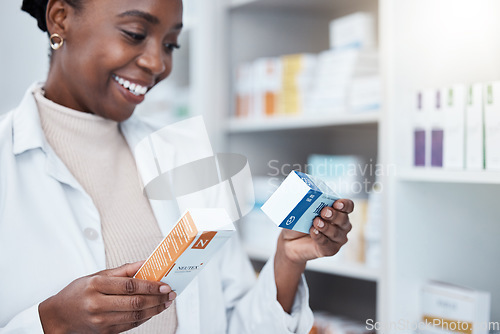 Image of Black woman, pharmacist and choice with box, medicine and decision with prescription for healthcare. Pharmacy, drugs and pharmaceutical pills for health, wellness or medical store with stock on shelf