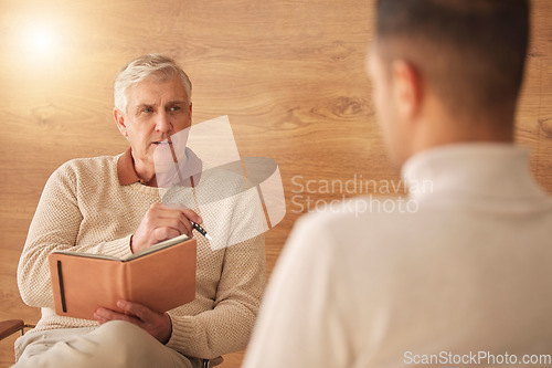 Image of Psychologist, counseling or man talking in therapy, mental healthcare or support in psychology consultation. Back view of patient speaking to listening senior therapist for medical help or advice