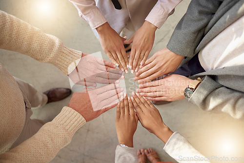 Image of Teamwork, top view or hands of business people in circle for motivation, corporate community or hope together. Collaboration, diversity or support of employees meeting for our vision, growth or goals