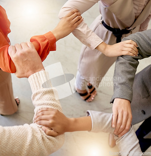 Image of Teamwork, people or hands connected in meeting together planning business or group project for motivation. Top, support or employees in collaboration for our vision, strategy mission or target goals