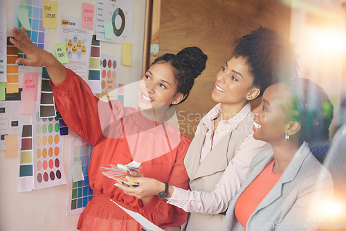 Image of Teamwork, board or fashion meeting for planning clothing, new colors or boutique clothes in collaboration together. Happy, women or creative designers speaking or working on group ideas or strategy