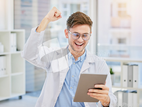 Image of Success, medical and tablet with doctor in hospital and cheering for celebration, report or achievement. Winner, research and technology with man reading good news for healthcare, medicine or science