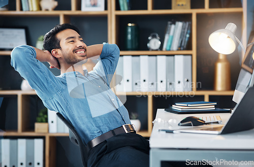 Image of Happy business man stretching to relax from easy project, complete achievement and happiness in office. Worker, smile and hands behind head to finish tasks, rest and break for productivity at desk