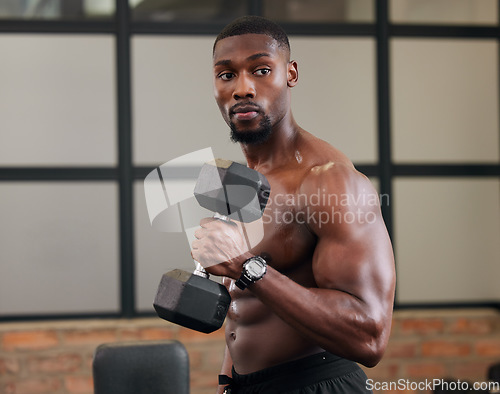 Image of Black man, weights training and gym fitness of a athlete doing power lifting for exercise. Sport workout, bodybuilding and African American male with strong arms, wellness and health exercising