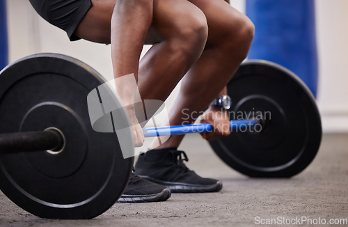 Image of Black man hands, barbell and weights training of a bodybuilder in a fitness gym. Exercise, workout and muscle of a African athlete doing sports, power deadlift and hard challenge in a health club