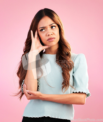 Image of Thinking, concentration and woman confused in studio with hand on head, ideas or solutions isolated on pink background. Mental health, doubt and hispanic model brainstorming problem and solution.