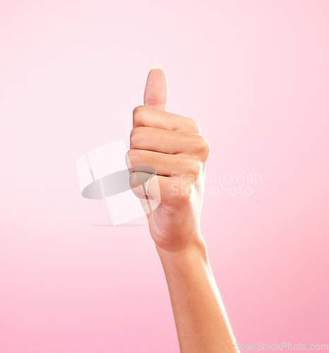 Image of Thumbs up, ok and hand of woman in studio for success, approval, achievement and support. Like, emoji and thank you with female and gesture isolated on pink background for positive, agreement and yes