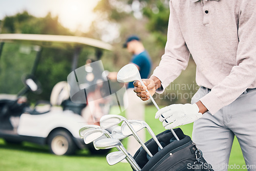 Image of Golf, choose club and hands of man with golfing bag to start game, practice and training for competition. Professional golfer, activity and male caddy with clubs for exercise, fitness and recreation