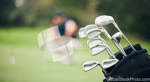 Image of Golf, sports and golfing club in bag on course for game, practice and training for competition. Professional golfer, sport mockup and closeup of caddy equipment for exercise, activity and recreation