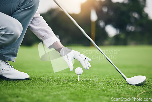 Image of Training, golf ball and tee with hand of black man on field for sports, tournament and challenge. Start, competition match and ready with athlete and club on course for action, games and hobby