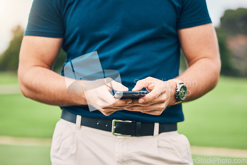 Image of Man, hands and phone texting in communication on golf course for sports, social media or networking outdoors. Hand of sporty male chatting on smartphone or mobile app for golfing research or browsing