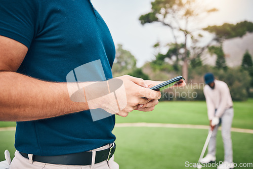 Image of Man, hands and phone texting in communication on golf course for sports, social media or networking outdoors. Hand of sporty male chatting on smartphone or mobile app for golfing research or browsing