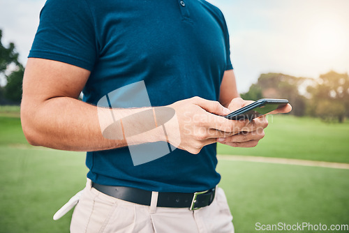 Image of Man, hands and phone in communication on golf course for sports, social media or networking outdoors. Hand of sporty male chatting or texting on smartphone mobile app for golfing research or browsing