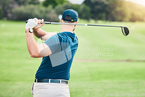 Image of Golf stroke, sport swing and golfer outdoor for game, fitness and exercise on grass. Athlete back, training and man at a sports club for cardio and workout on a green course with focus and action