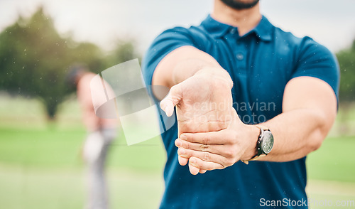 Image of Golf, sports and man stretching hand on course for game, practice and training for competition. Professional golfer, fitness and hands of male athlete warm up for exercise, golfing and recreation