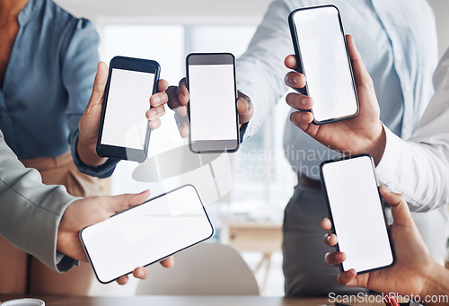 Image of Business people, hands or phone screen on mockup in office networking, advertising or digital marketing. Team of employees with online product placement on display on mobile application or website ux