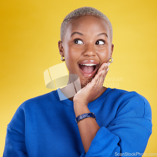 Image of Wow, thinking and eureka with a black woman in studio on a yellow background looking thoughtful or surprised. Idea, wonder and aha with an attractive young female feeling shocked or contemplative