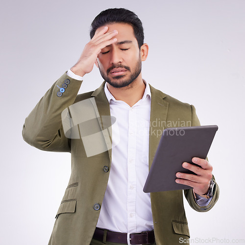 Image of Business man, headache and tablet in a studio feeling frustrated from stress and anxiety. Employee burnout, depression and digital tech issue with isolated white background and 404 web problem