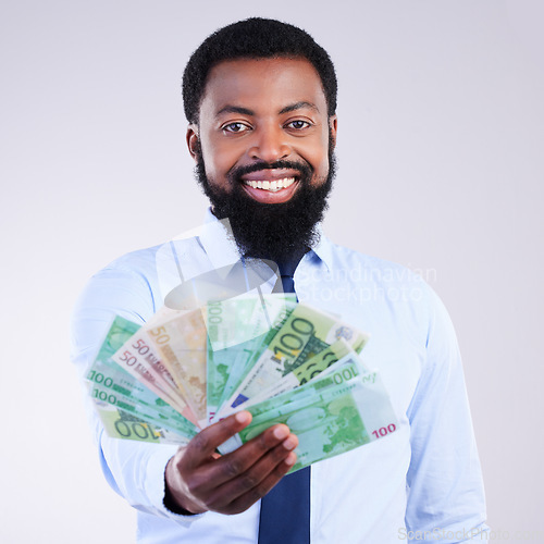 Image of Finance, money and portrait of black man in studio for winner, investment and wealthy. Success, payment and profit with male holding cash isolated on white background for cashback, salary and rich