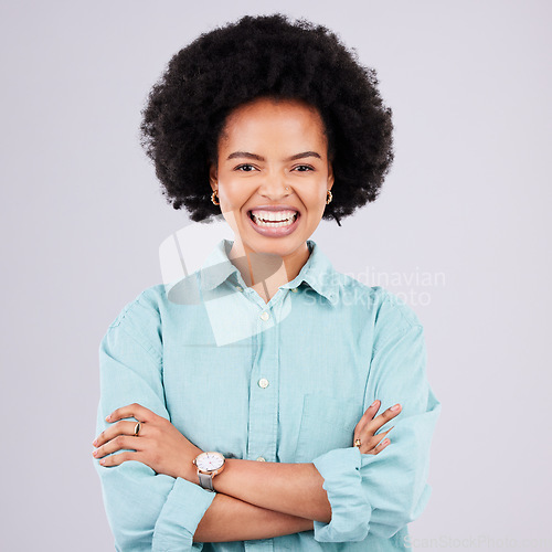 Image of Happy, arms crossed and portrait of black woman in studio for confidence, positive and empowerment. Happiness, funny and elegant with female isolated on white background for young, excited and pride