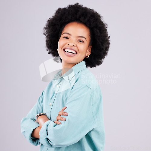 Image of Arms crossed, laugh and portrait of black woman in studio for confidence, positive and empowerment. Happiness, smile and elegant with female isolated on white background for young, excited and pride