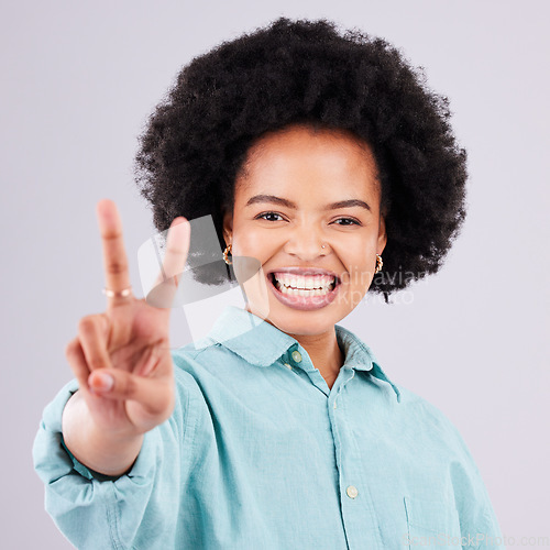Image of Smile, peace sign and portrait of black woman in studio for positive, agreement and support. Confidence, happy and emoji with female isolated on white background for friendly, cheerful and carefree