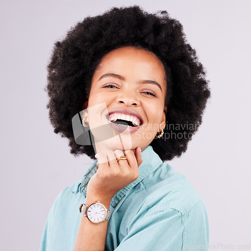 Image of Happy, funny and portrait of black woman in studio for confidence, positive and empowerment. Happiness, laugh and elegant with face of female isolated on gray background for young, excited and pride