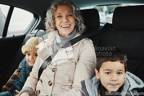 Image of Portrait, road trip and grandmother travel with children or grandchildren and relax on a car ride in the backseat. Bonding, happy and grandma traveling with kids or grandkids on a journey