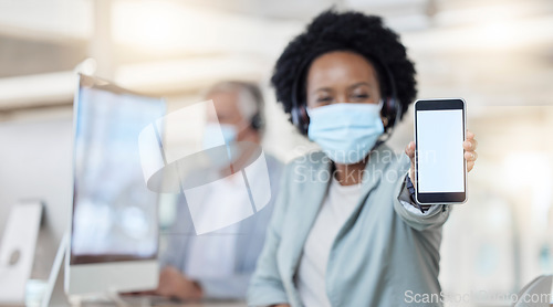 Image of Call center, phone and woman face mask with mockup for covid compliance, safety and health mobile app. African telemarketing agent, consultant or person portrait and cellphone screen or mock up space