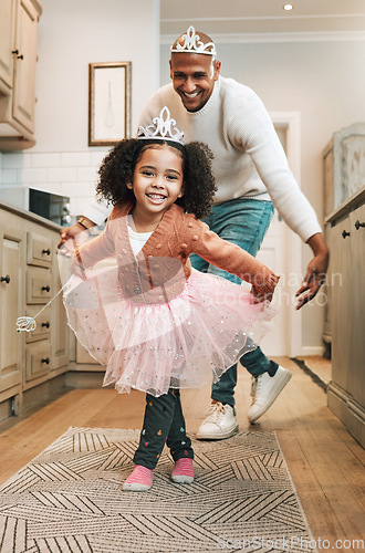 Image of Child tutu, parent ballet dance and portrait of girl and father together bonding with dancing in the kitchen. Home, kid and dad with love and care in a house playing a dancer game for children fun