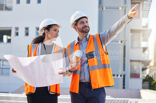 Image of Architecture people pointing outdoor with blueprint planning, teamwork and construction worker at city site. Engineering project, floor plan and woman, contractor or partner for building development