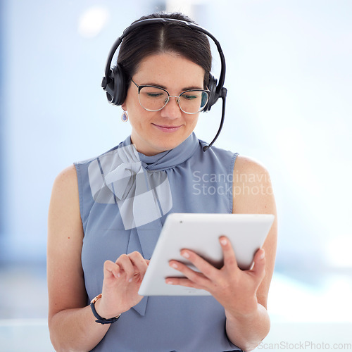 Image of Tablet, customer service and support with a business woman doing a search on the internet to help a client. Research, contact and data with a female employee consulting using a headset in her office